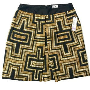 Worthington front plead blk/gold coils print skirt